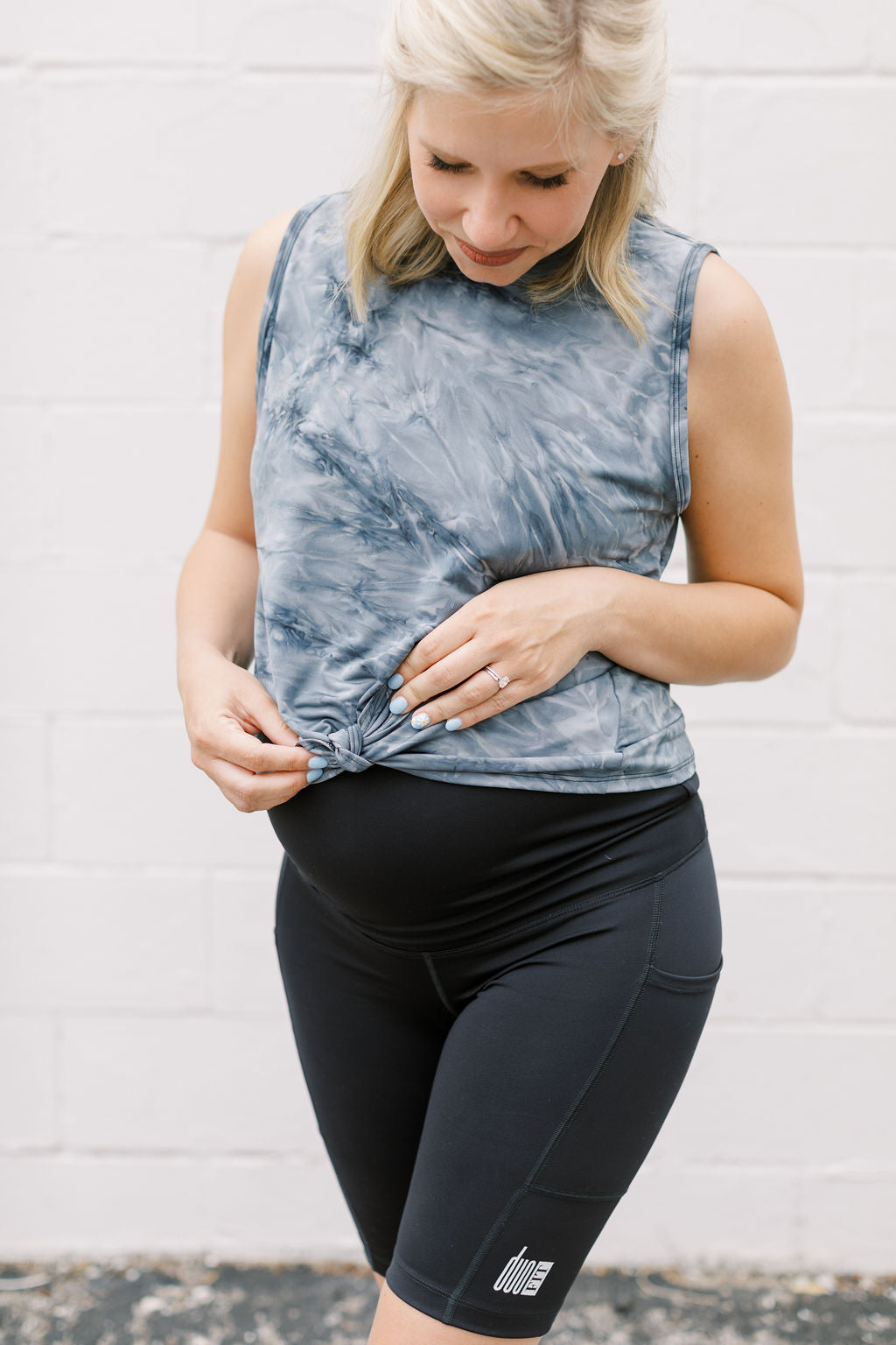 Soft tempest grey maternity activewear and postpartum tank with a front tie