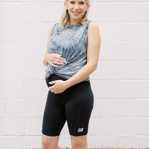 Soft tempest grey maternity activewear and postpartum tank with a front tie