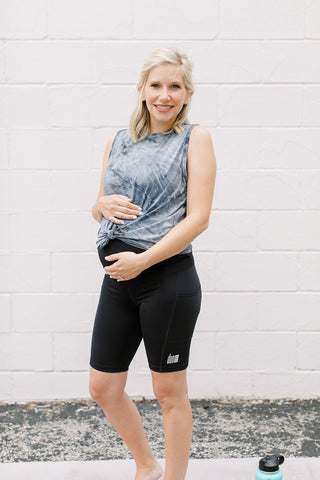Soft tempest grey maternity activewear and postpartum tank with a front tie