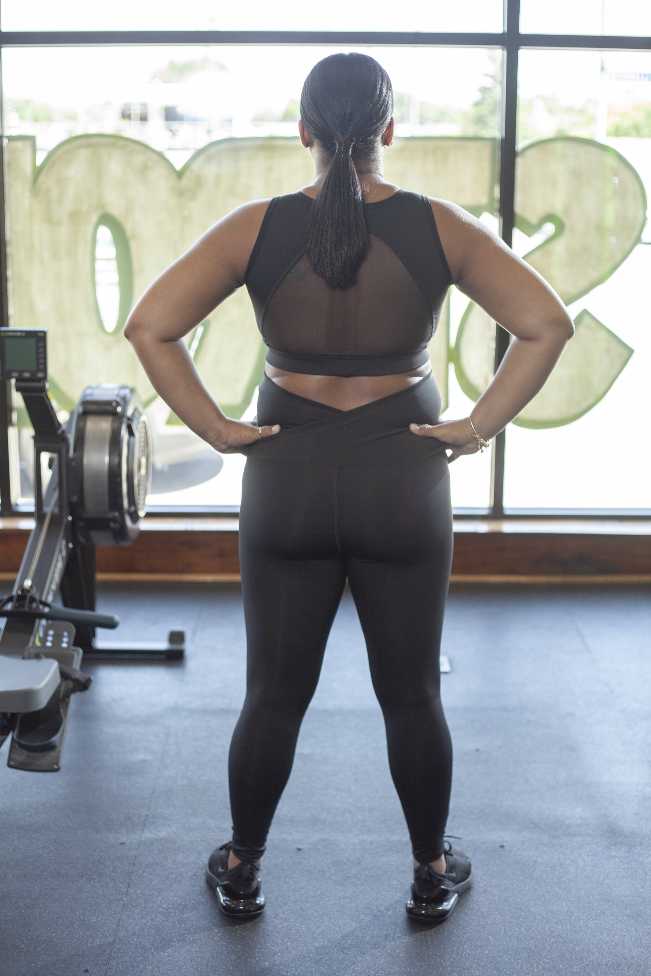 Black Maternity Activewear Nursing Sports Bra with a breathable mesh back and removable clips for nursing