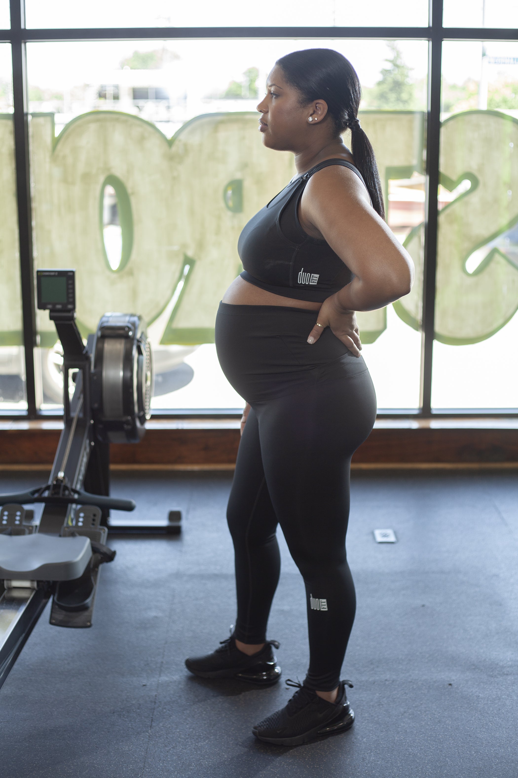 Black Maternity Activewear Nursing Sports Bra with a breathable mesh back and removable clips for nursing